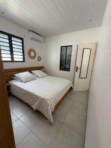 Ένα ή περισσότερα κρεβάτια σε δωμάτιο στο Villa O'CAMPÊCHE