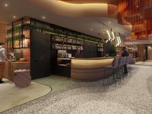 una representación de un bar en un restaurante en Novotel Tallinn, en Tallin