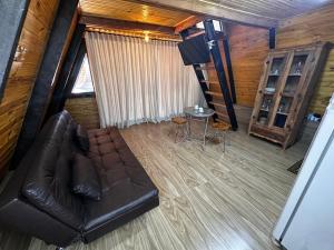 Posezení v ubytování Chalé às margens da represa