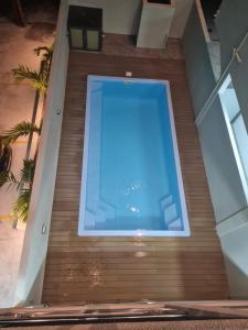 Bazén v ubytování Arc en ciel 2 nebo v jeho okolí