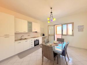Kuchyň nebo kuchyňský kout v ubytování Appartamento Pace