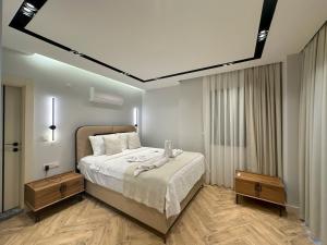 Postel nebo postele na pokoji v ubytování Nokta VIP D Villa