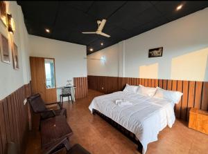 Ένα ή περισσότερα κρεβάτια σε δωμάτιο στο HillviewHOMESTAY