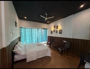 Ένα ή περισσότερα κρεβάτια σε δωμάτιο στο HillviewHOMESTAY +1 φωτογραφίες