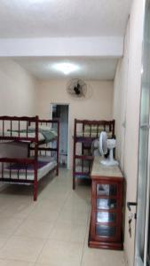 Ένα ή περισσότερα κρεβάτια σε δωμάτιο στο Casa 2