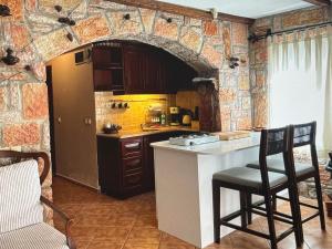 Η κουζίνα ή μικρή κουζίνα στο Center amazing view +9 φωτογραφίες