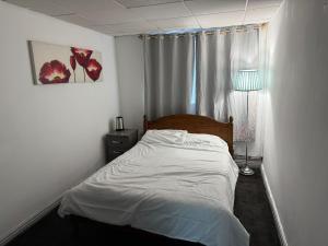 Ένα ή περισσότερα κρεβάτια σε δωμάτιο στο Prime Hotel