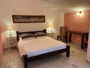 Ένα ή περισσότερα κρεβάτια σε δωμάτιο στο B&B Rossofiore