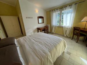 Ένα ή περισσότερα κρεβάτια σε δωμάτιο στο B&B Rossofiore