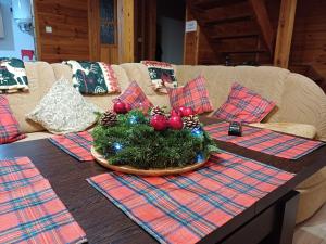 Posezení v ubytování Domek u Bartnika z basenem na Mazurach