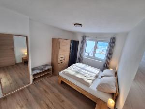 Postel nebo postele na pokoji v ubytování Ferienwohnung Peham