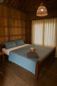 Postel nebo postele na pokoji v ubytování Gecko Guesthouse