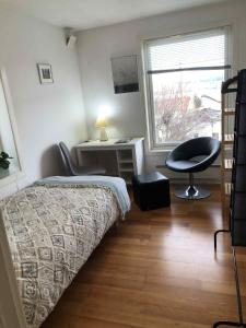 Ένα ή περισσότερα κρεβάτια σε δωμάτιο στο Trondhjemsvegen