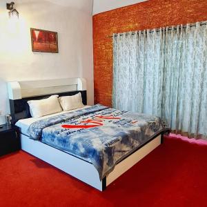 Postel nebo postele na pokoji v ubytování MT'S Villas