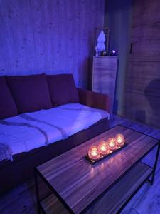 Ένα ή περισσότερα κρεβάτια σε δωμάτιο στο Une bulle de Bonheur