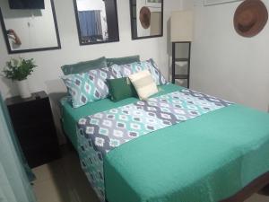 Ένα ή περισσότερα κρεβάτια σε δωμάτιο στο Fruta de mango #2