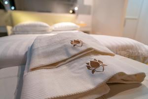 Ένα ή περισσότερα κρεβάτια σε δωμάτιο στο Luxury Trevi