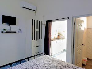 Ένα ή περισσότερα κρεβάτια σε δωμάτιο στο Italiana Hogares