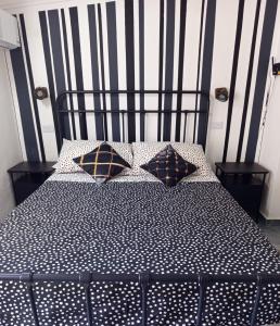 Ένα ή περισσότερα κρεβάτια σε δωμάτιο στο Italiana Hogares