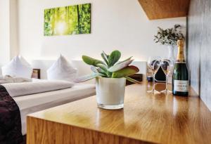 Postel nebo postele na pokoji v ubytování Seevital Hotel & SPA - Ihr 4 Sterne Superior Hideaway direkt am See