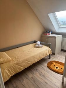 Ένα ή περισσότερα κρεβάτια σε δωμάτιο στο Au petit Logelbach