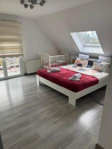 Ένα ή περισσότερα κρεβάτια σε δωμάτιο στο Au petit Logelbach