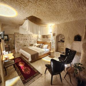 Postel nebo postele na pokoji v ubytování Memories Cave House Adults Only Plus 12