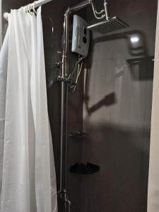 Φωτογραφία από το άλμπουμ του Cozy Makati Hideaway Walk to Malls σε Sampong