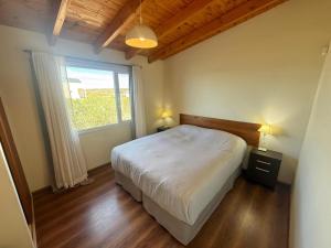 En eller flere senge i et værelse på Casa Costa de Mar