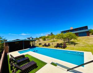 Πισίνα στο ή κοντά στο Complejo Acanto