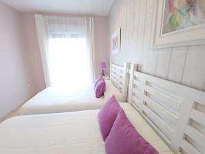 Ένα ή περισσότερα κρεβάτια σε δωμάτιο στο bellazaira