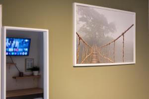 TV a/nebo společenská místnost v ubytování 98 Aparthotel - Botanique 1