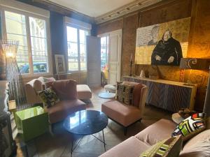 Χώρος καθιστικού στο Le Passage des Décorateurs T3 Spacieux et central