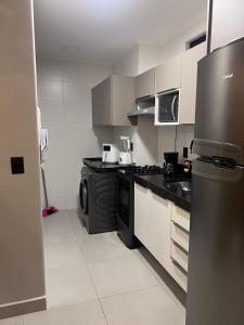 Η κουζίνα ή μικρή κουζίνα στο Studio Design 3 Lions