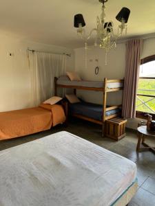 Postel nebo postele na pokoji v ubytování Hostal La Vie est Belle