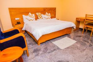 Postel nebo postele na pokoji v ubytování Escape Villa - Kilimanjaro