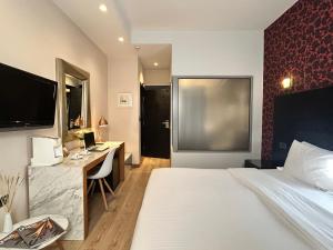 Ένα ή περισσότερα κρεβάτια σε δωμάτιο στο Areos  +64 φωτογραφίες