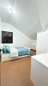 Ένα ή περισσότερα κρεβάτια σε δωμάτιο στο Ba-ey Khadpay