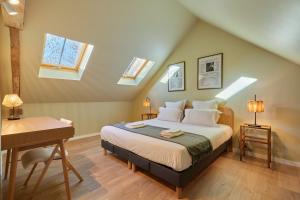 Postel nebo postele na pokoji v ubytování Le Cottage du Bessin - Proximité historique - Bayeux