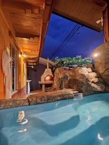 Πισίνα στο ή κοντά στο Casa Volcan Arenal