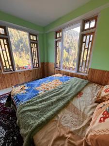 Ένα ή περισσότερα κρεβάτια σε δωμάτιο στο Orchard stay