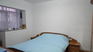 Ένα ή περισσότερα κρεβάτια σε δωμάτιο στο Opio's House