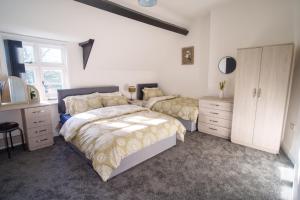 En eller flere senge i et værelse på Stunning Countryside Retreat & Getaway!