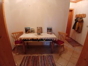 En eller flere senge i et værelse på Enzianhütte Gerlitzen Kanzelhöhe