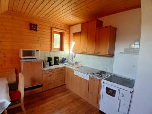 Køkken eller tekøkken på Enzianhütte Gerlitzen Kanzelhöhe