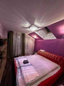 Voodi või voodid majutusasutuse Harmony Villa Craiova toas