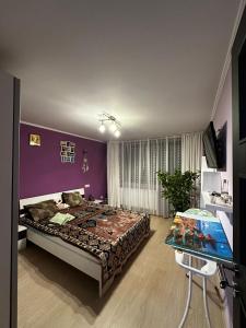 Voodi või voodid majutusasutuse Harmony Villa Craiova toas