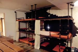 Двухъярусная кровать или двухъярусные кровати в номере perBed Hostel-Sun Moon Lake Station