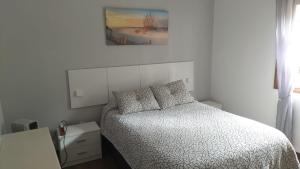 Postel nebo postele na pokoji v ubytování ACOGEDOR Y LUMINOSO PISO CÉNTRICO