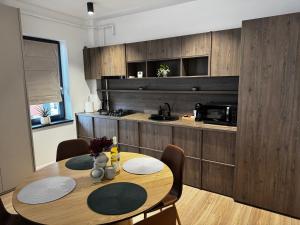 Η κουζίνα ή μικρή κουζίνα στο District Deluxe